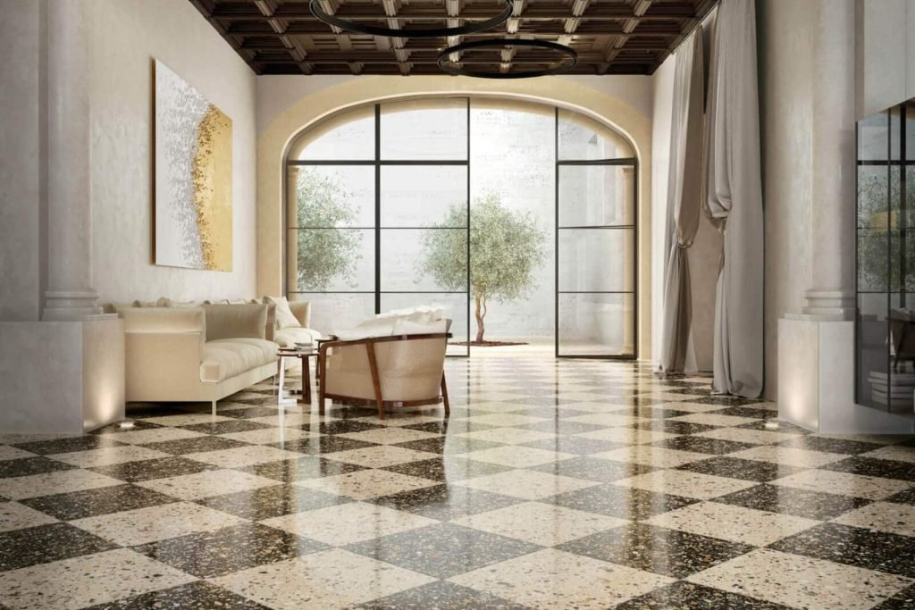 Expansive room with a checkered tile floor and white furniture, representing tile flooring services in Fresno, CA.
